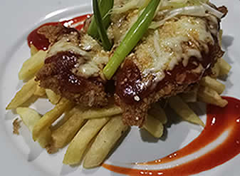 Crispy fried chicken fillet with fries, a Bangcogon Restaurant dish