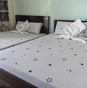 A twin-bed room configuration at Bangcogon Resort, similar in style to the Quadruple Room